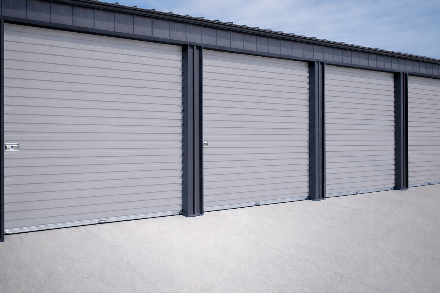Overhead Doors | Garage Door - Storage Doors | Commercial roll up door in a silhouette gray color