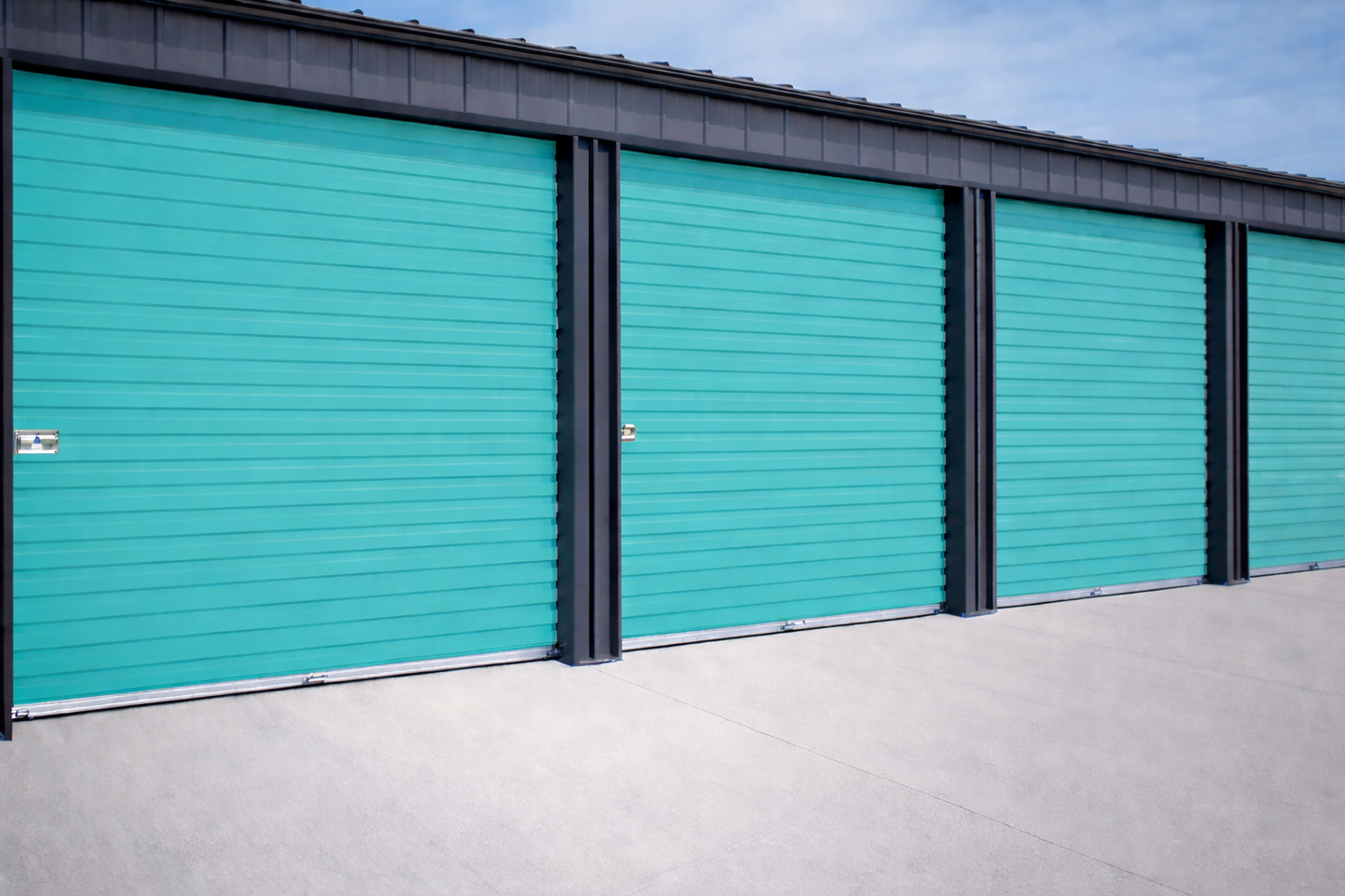 Overhead Doors | Garage Door - Storage Doors | Commercial roll up door in a teal color