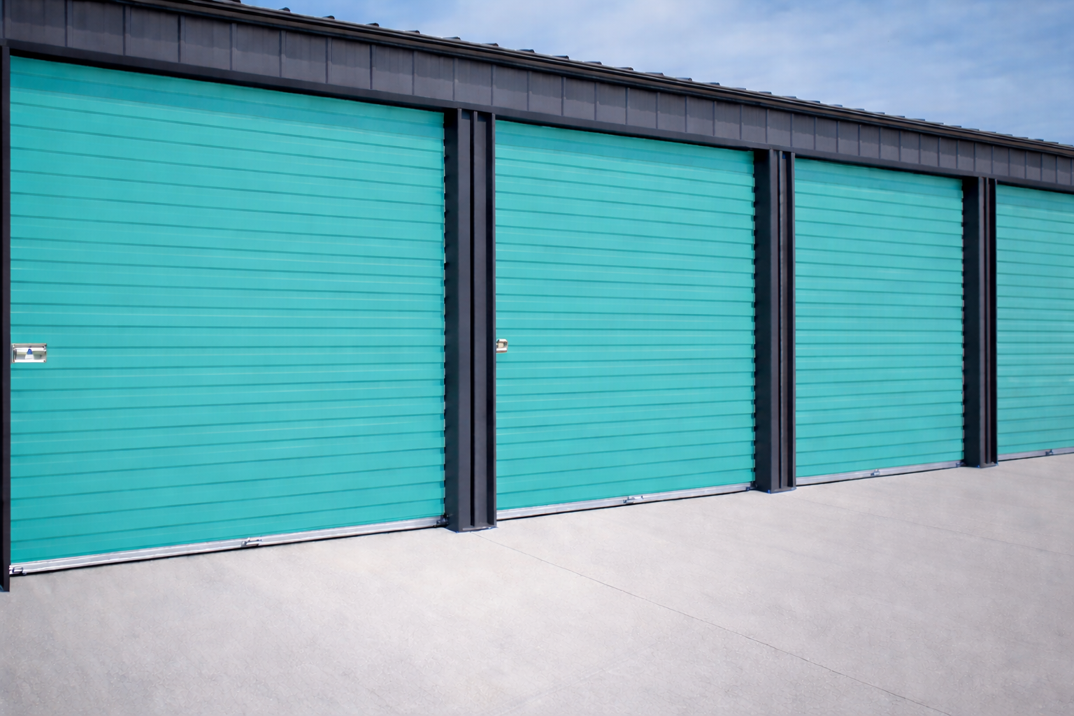Overhead Doors | Garage Door - Storage Doors | Commercial roll up door in a teal color